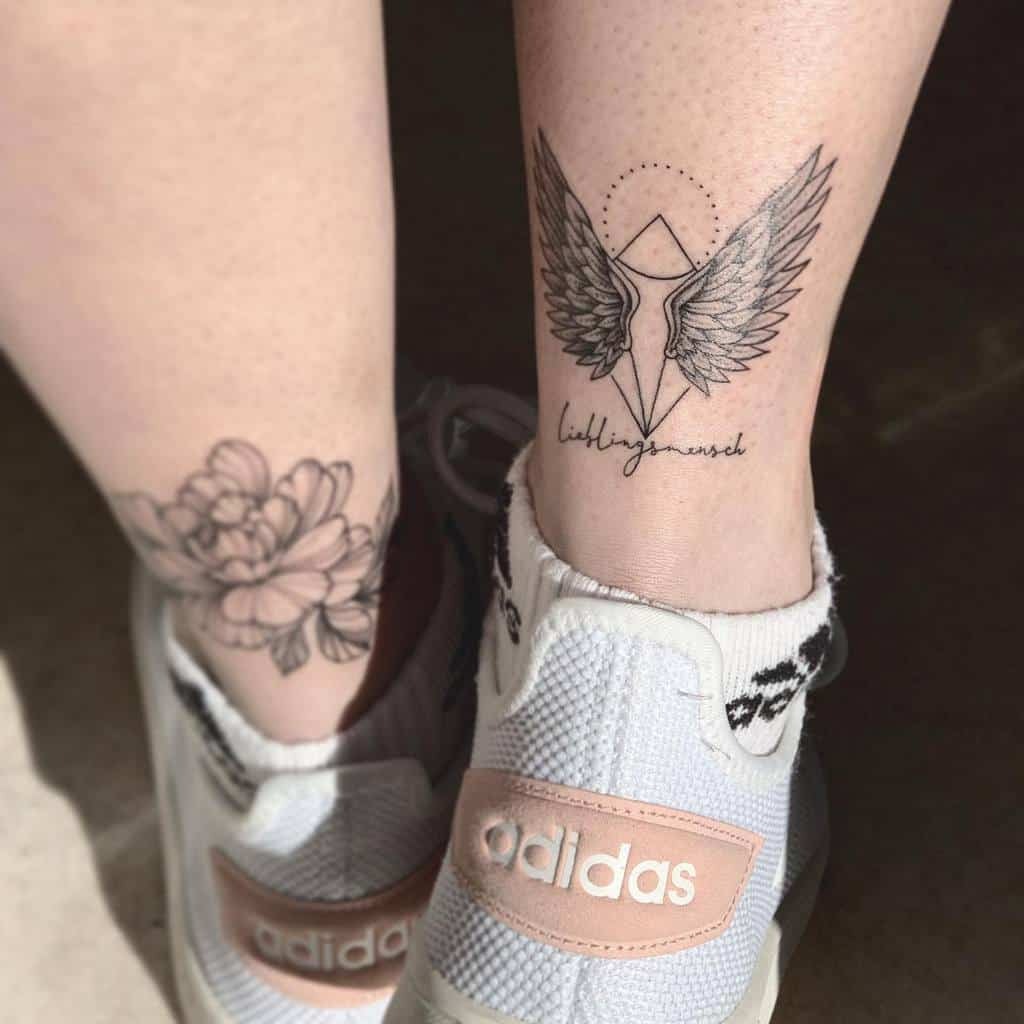 ankle angel wings tattoo