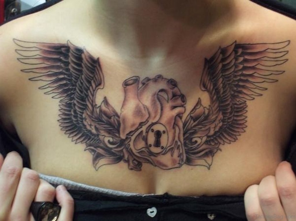 brest angel wings tattoo