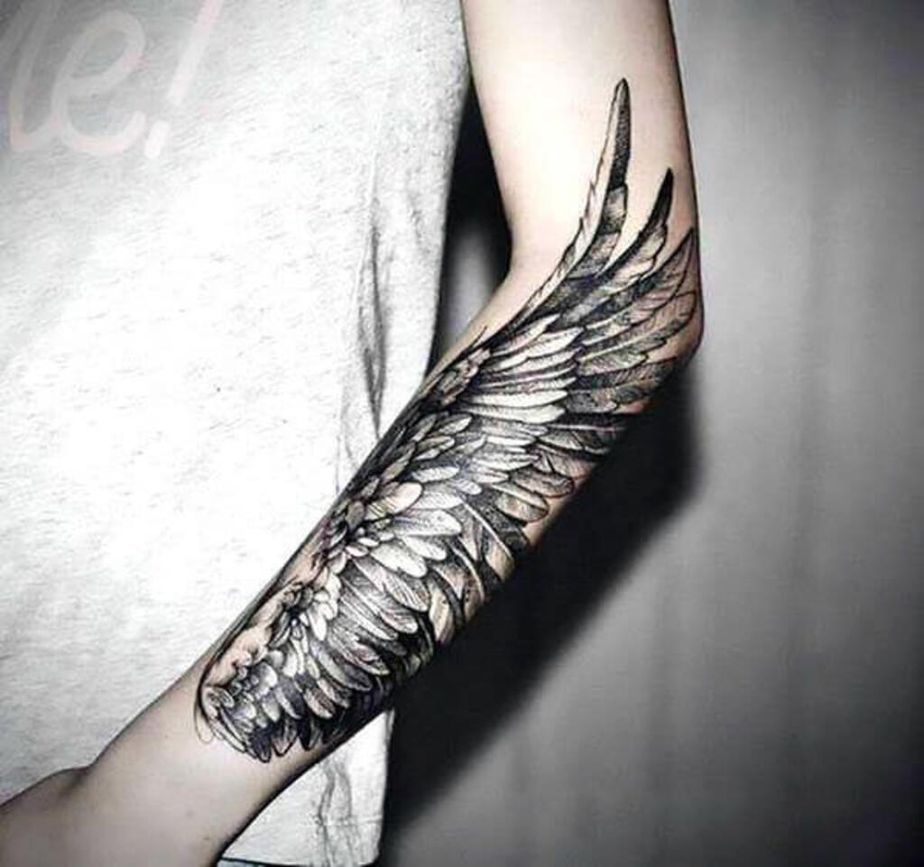 forearm angel wings tattoo