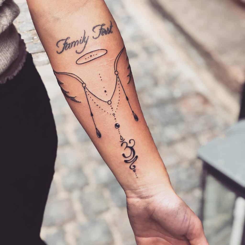 wing tattoo on hand