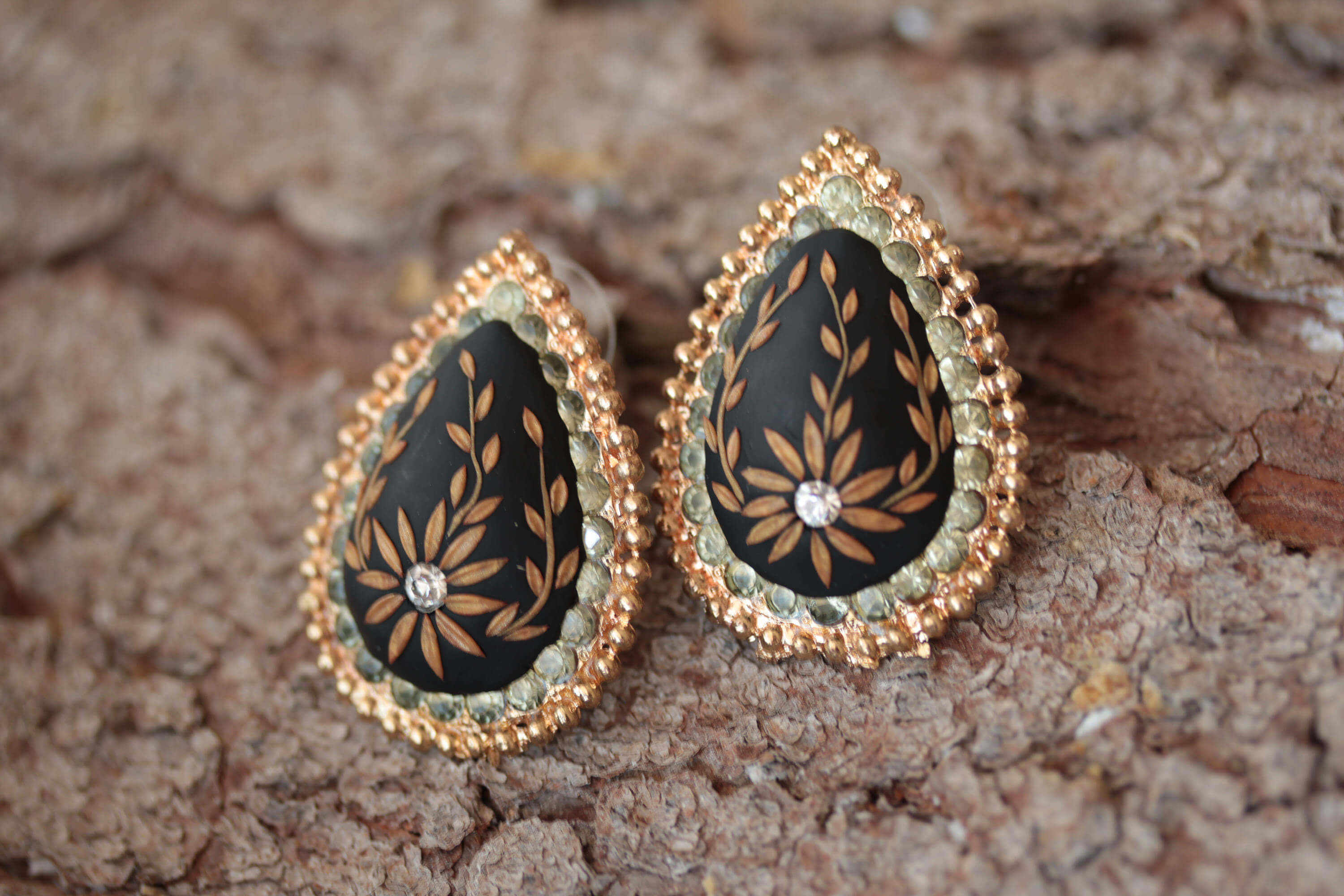 earrings with gold design 