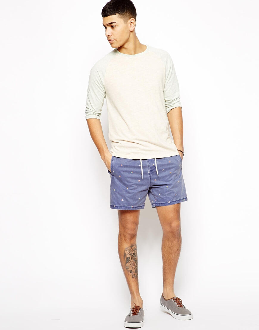 men fashion with tattoo on leg