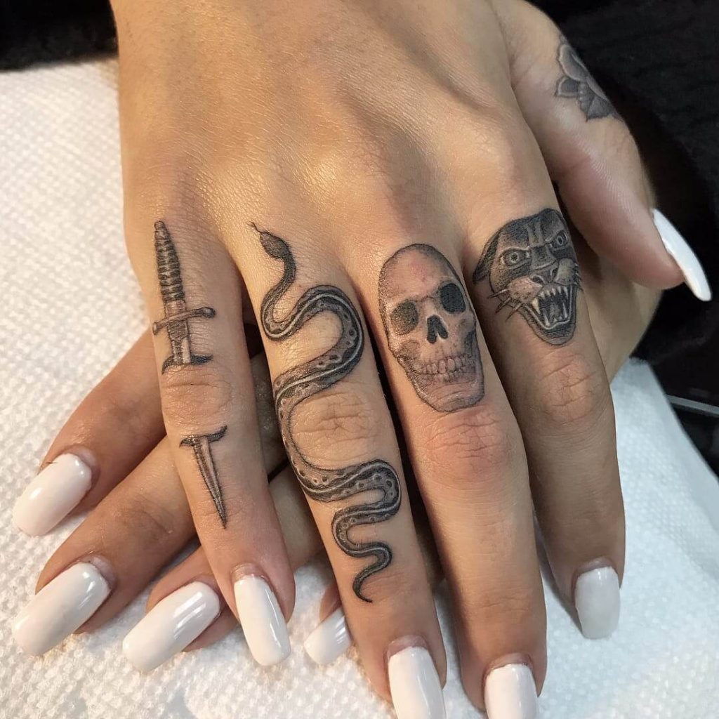 Devil's Hand finger tattoos