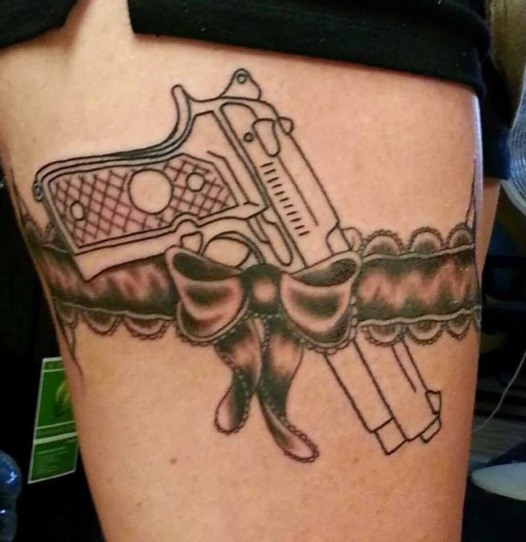 Garter Gun Thigh Tattoo