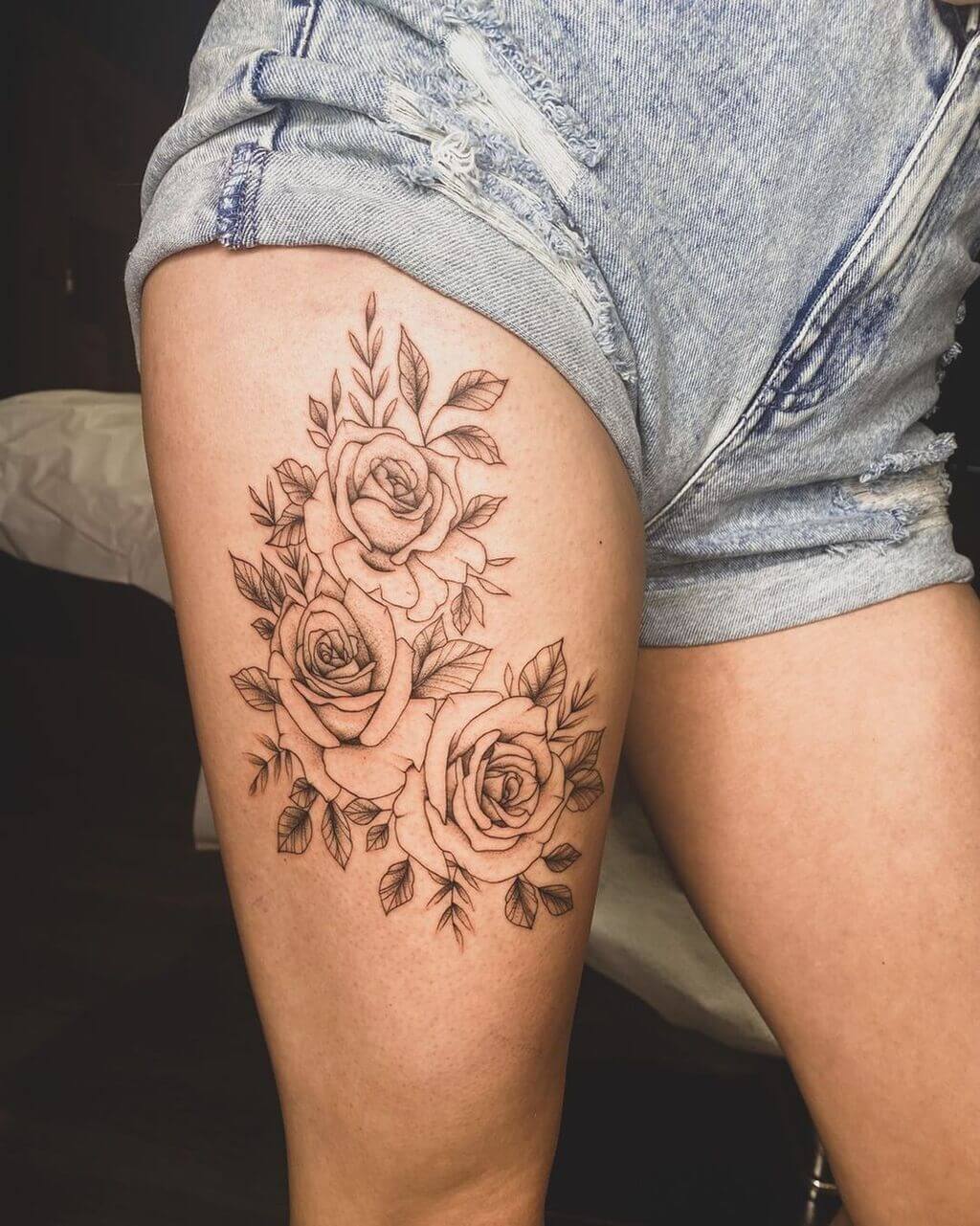 unique thigh tattoo