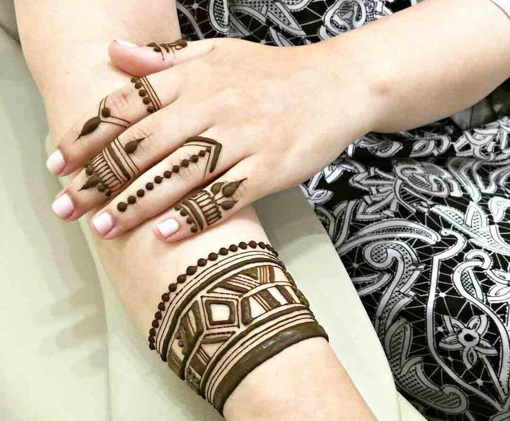 Finger Covering Back Hand Mehndi Design