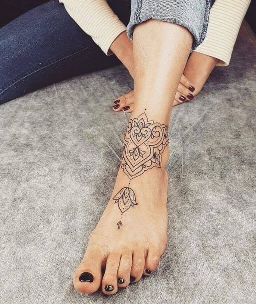 classy small foot tattoos for females