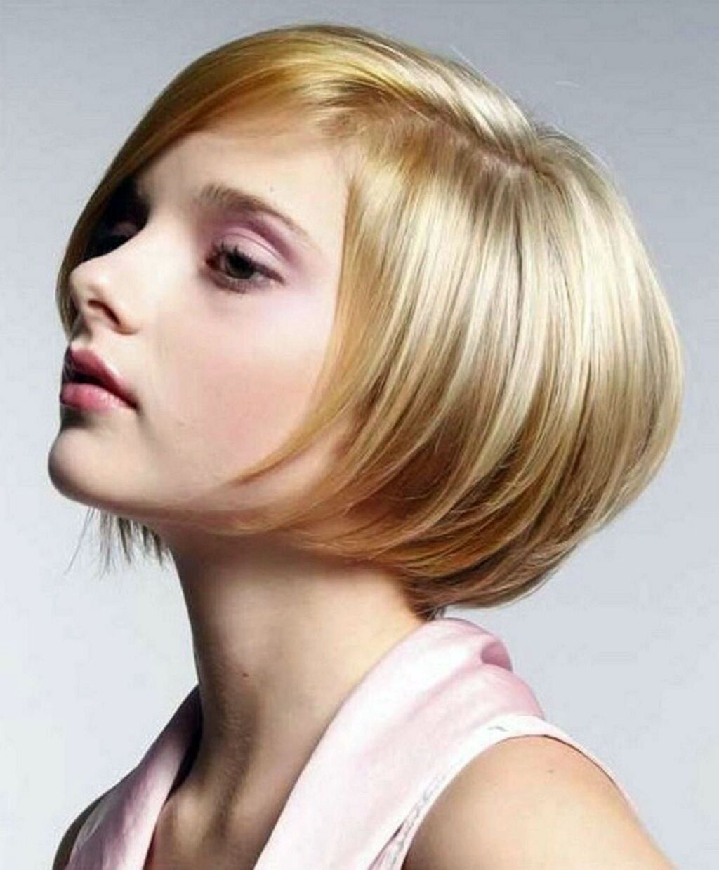 woman with blonde short stacked bob hairstyle