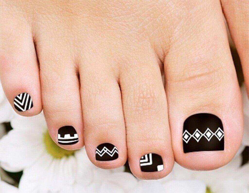 Black and white Tribal Toenail Designs