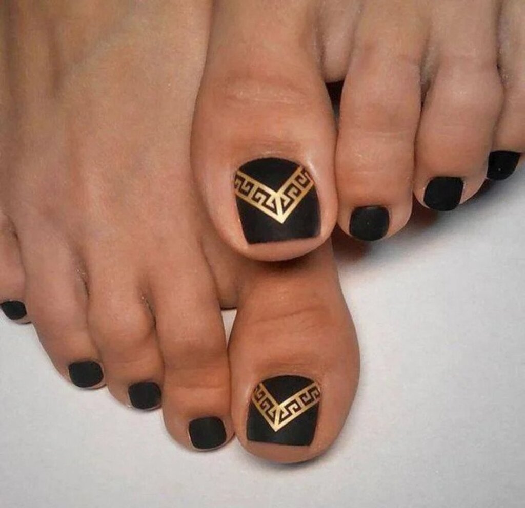 Black and gold Tribal Toenail Designs