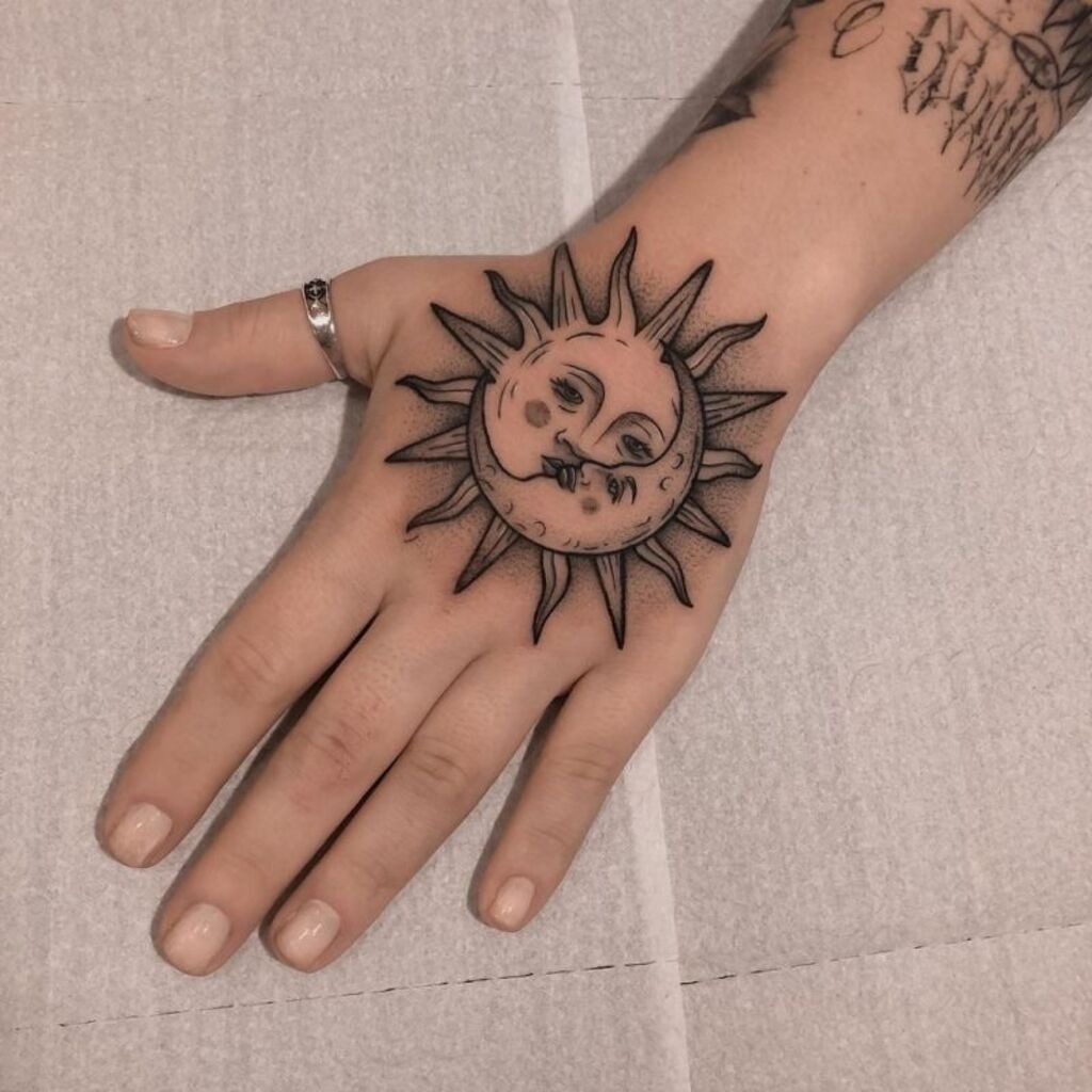 sun and moon tattoo on arm for women 