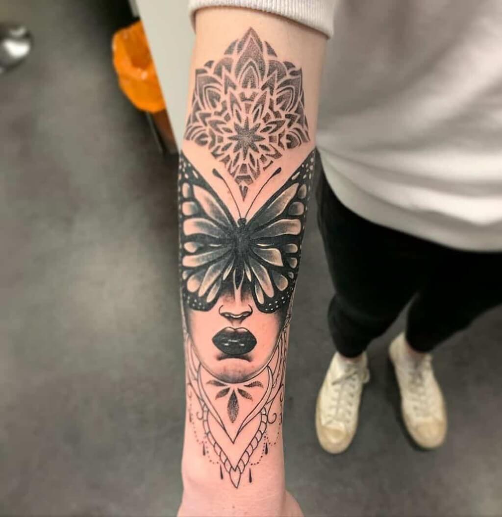 female classy half sleeve tattoo