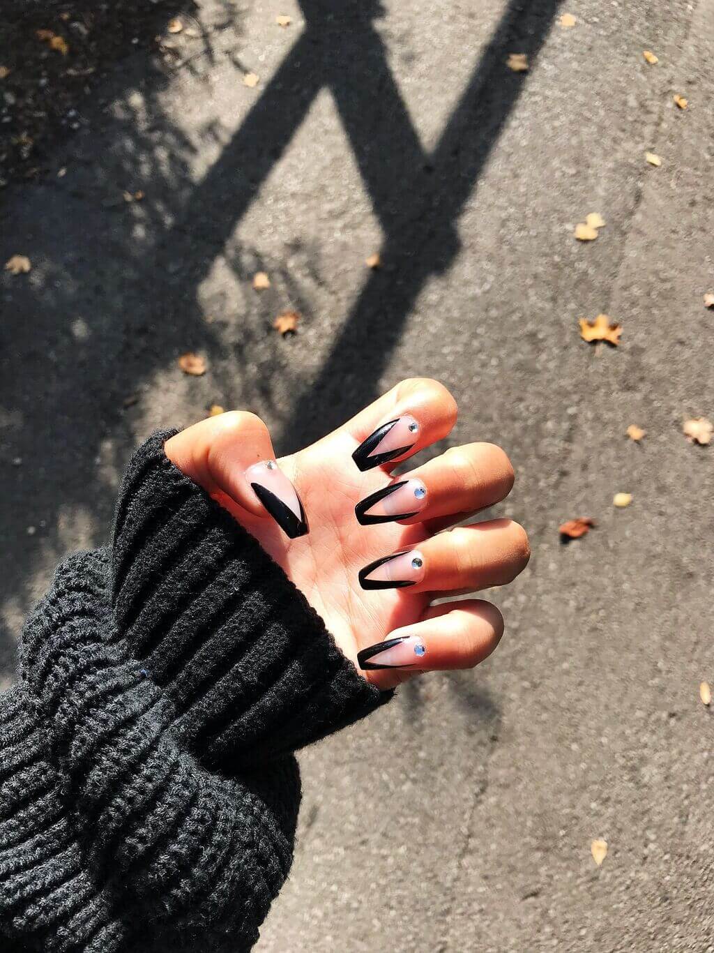 Short Black French Tip Nails with V-Shape Glitter Tint