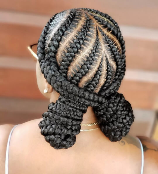Large Tribal Braids with Two Low Buns