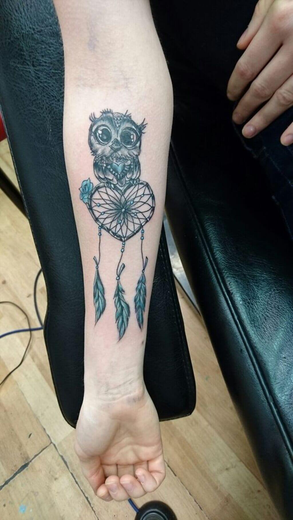 meaningful dream catcher tattoo on thigh