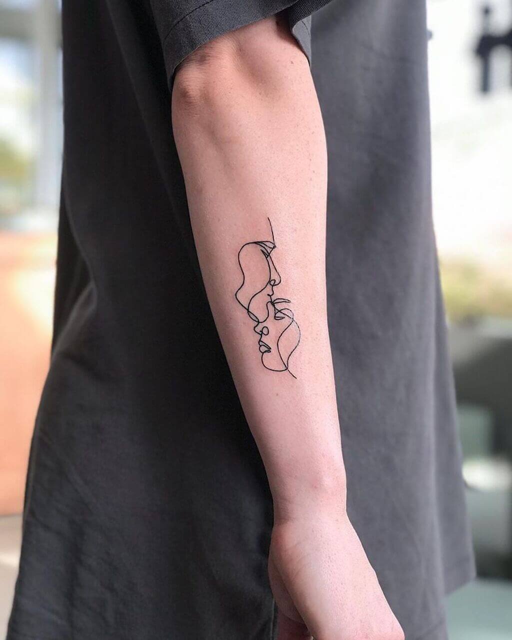 Fine Line Arm Tattoo