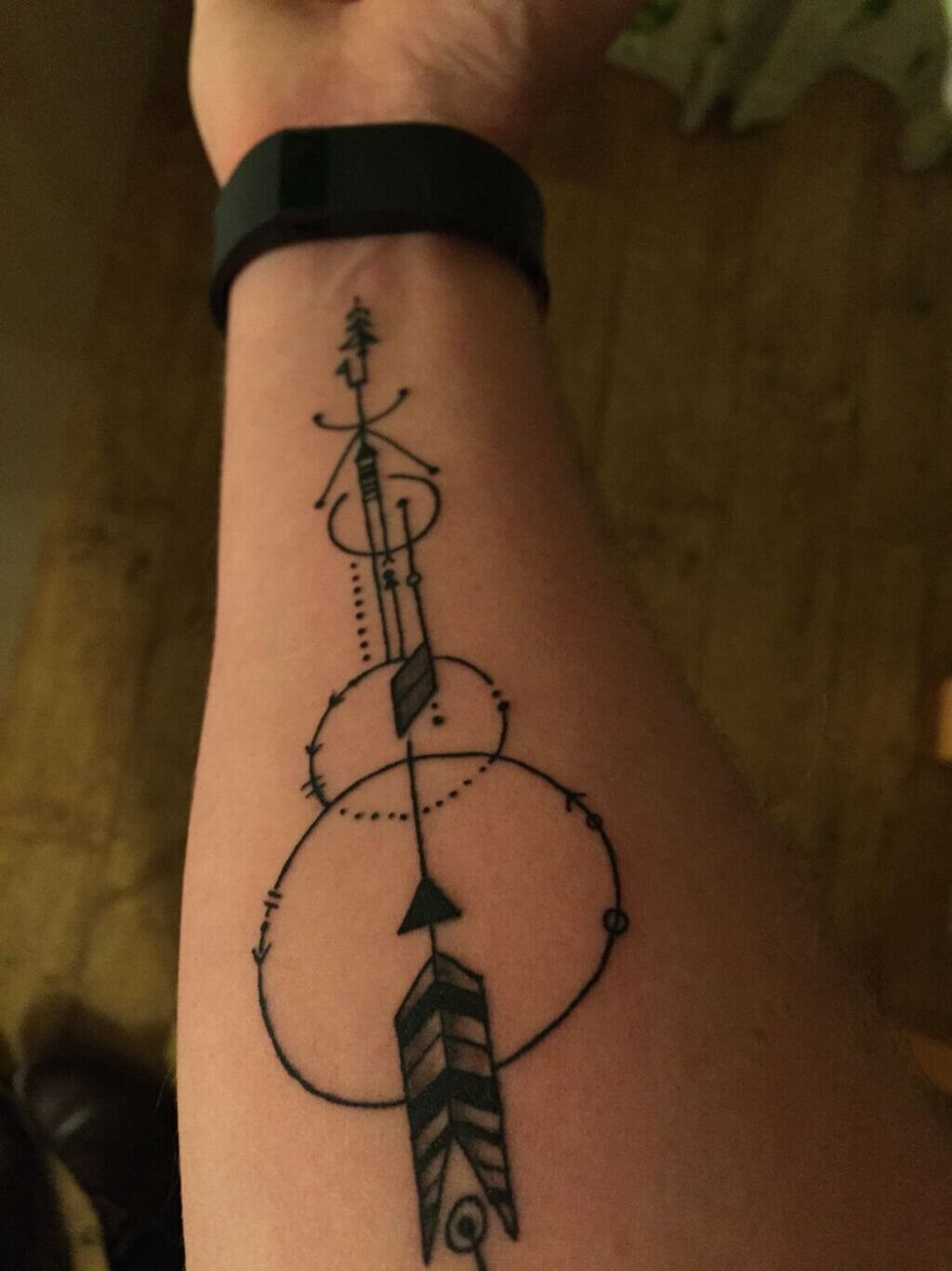 Arrow and Constellation Forearm Tattoo