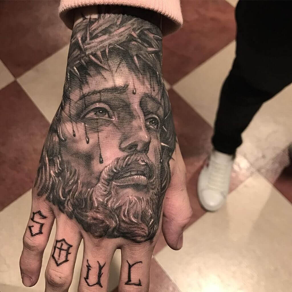 Jesus Christ Hand Tattoo