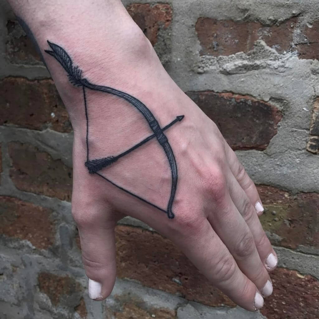 Bow and Arrow Hand Tattoo