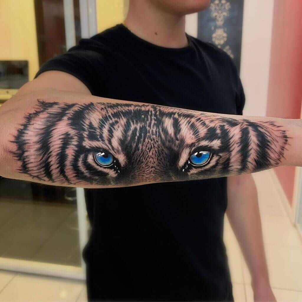 Tiger Eye Tattoo on a Side of the Hand