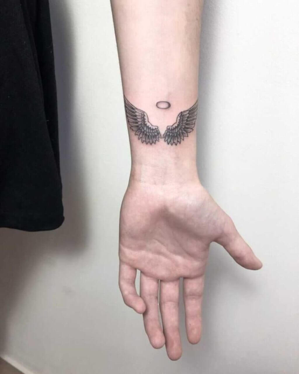 Angelic Small Hand Tattoo
