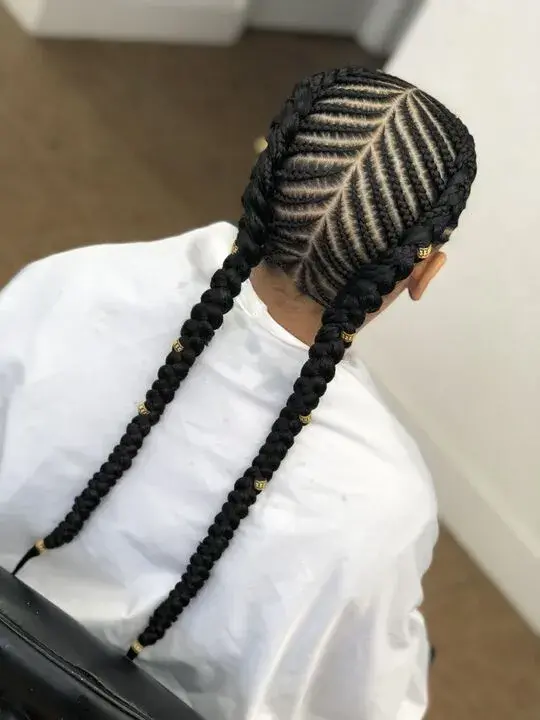 A woman with long black Two-sided Stitch Braids
