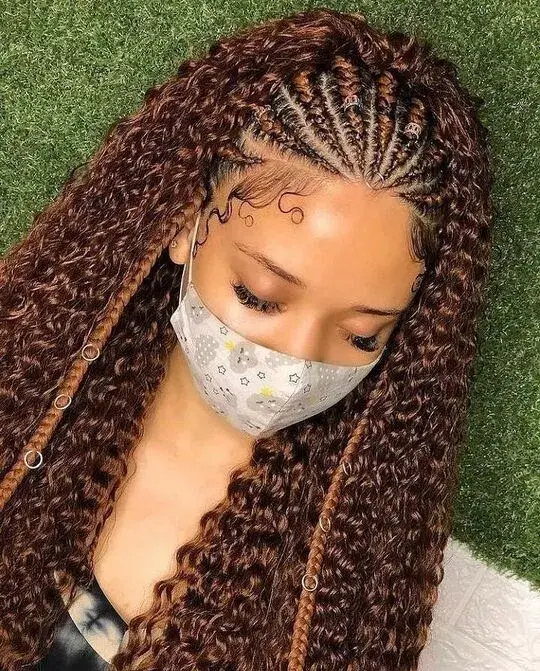 woman with Stitch Braids with a Sew-In  wearing a face mask