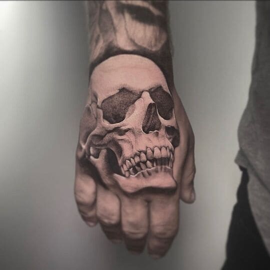 skeleton tattoo on hand