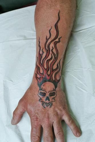 skeleton tattoo on hand