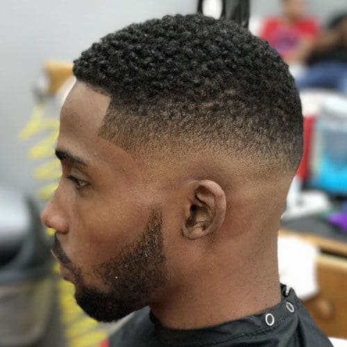 Low Taper Fade with S-Curls