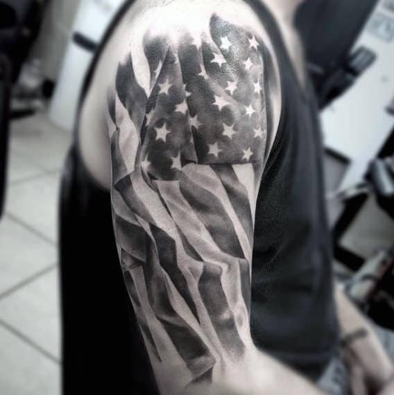 Cool Patriotic Flag Tear Skin Tattoo On Back Shoulder