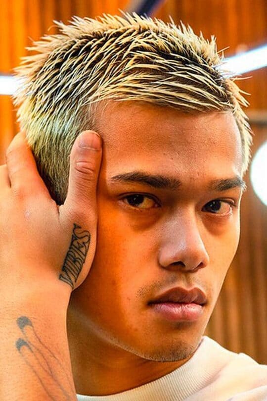 asian men long hairstyles with tattoo on  arm