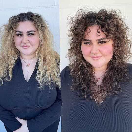 curly layered hair with curtain bangs