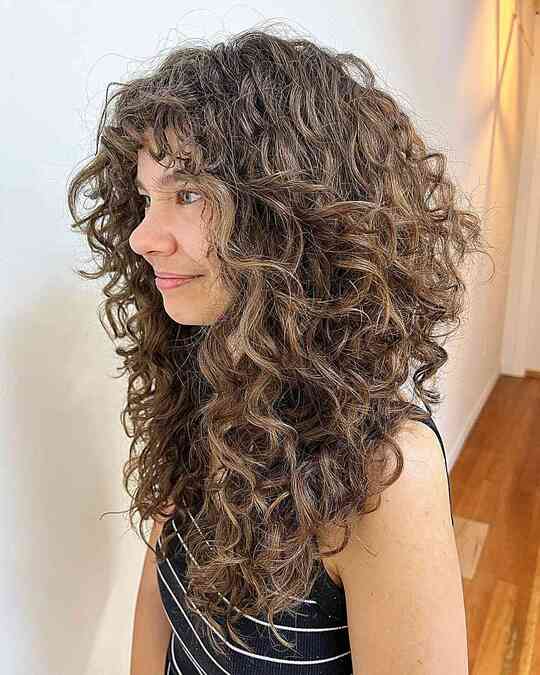 Wild Curls and Layers layered haircuts for curly hair