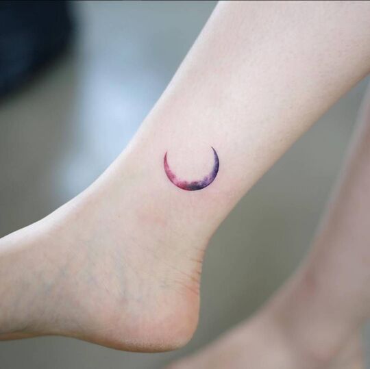 Crescent moon ankle tattoo