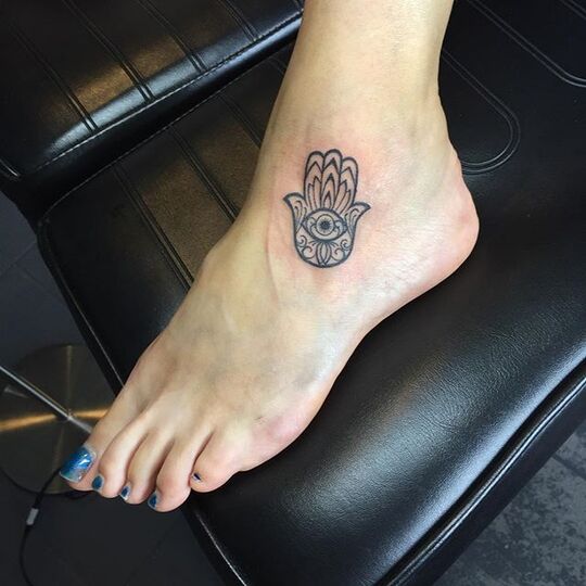 Hamsa hand ankle tattoo