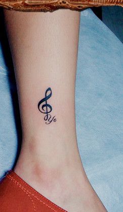 Musical notes ankle tattoo