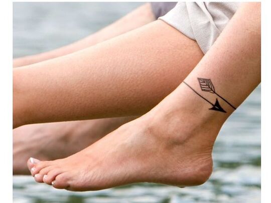 Petite arrow ankle tattoo