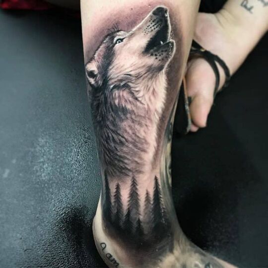 Wolf ankle tattoo