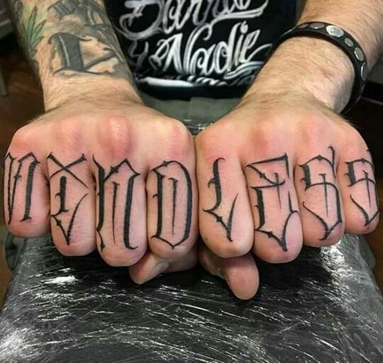 Alphabet tattoo on hand for men