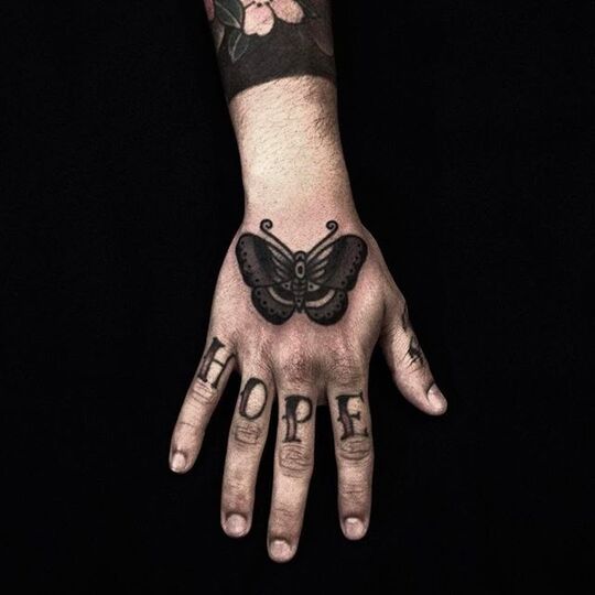 Black Butterfly Tattoos on hand for Men