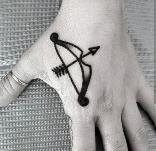 Bow and Arrow Hand Tattoos for Men