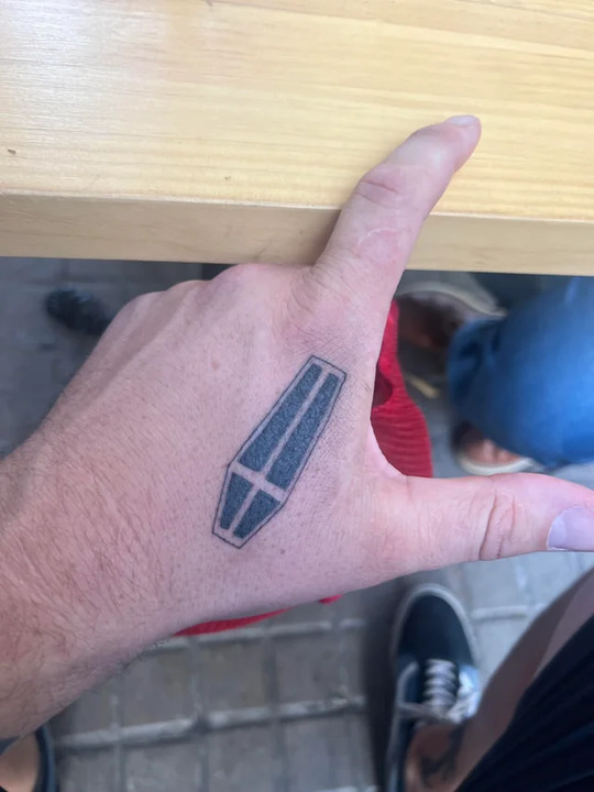 Coffin tattoo on hand for men