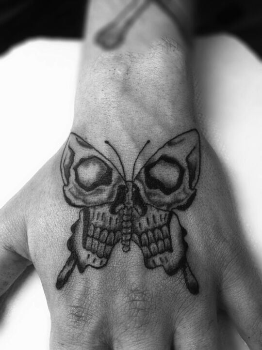 Devil Butterfly tattoo on hand for men