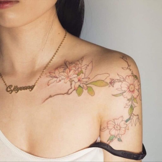 Half Chest Shoulder Tattoo With Flowers for women