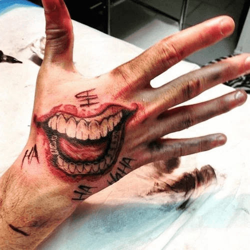 Joker mouth Hand Tattoo men