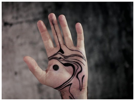 Palm tattoo on hand for men