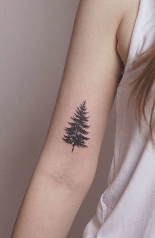 Pine tree hand tattoo