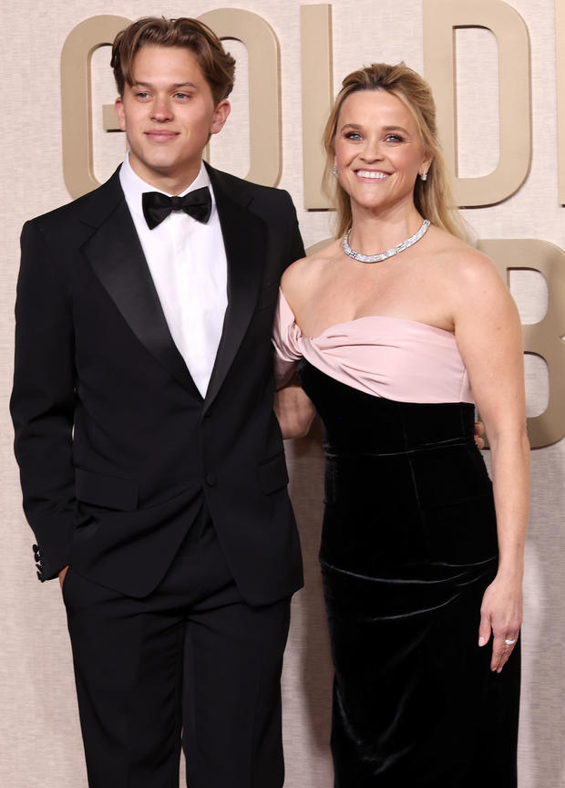 Reese Witherspoon and Deacon attend the 81st Annual Golden Globe Awards 
