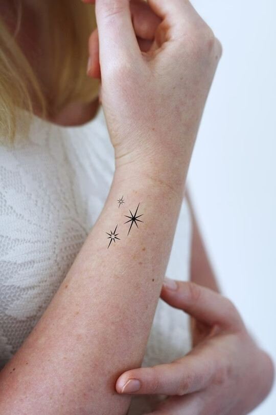 Star tattoo on hand